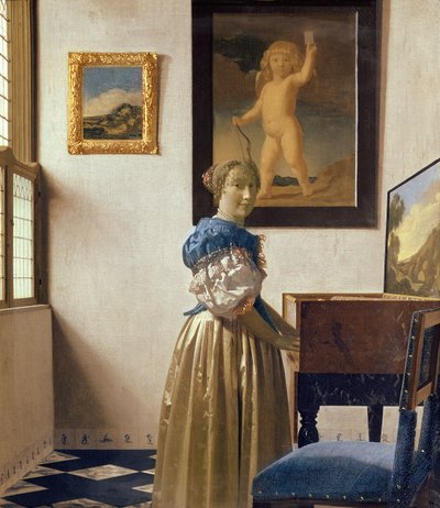 Eine junge Frau, die an einem Virginal steht, ca. 1670-72 von Jan Vermeer van Delft